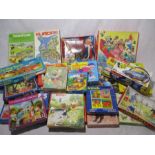 A collection of 1970's children's jigsaw puzzles and games