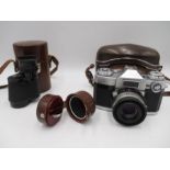 A Zeiss Ikon Contaflex camera along with a Carl Zeiss 8x30 monocular etc.