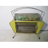 A 1950's kitsch electric fire with plastic flower display to top- please note this is for decorative