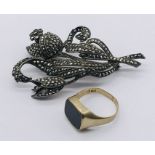 An 8ct gold (marked 333, total weight 3g) signet ring along with a 925 silver marcasite brooch in