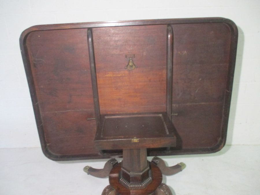 A Victorian rosewood veneered tip up table on quatrefoil legs. - Image 10 of 16