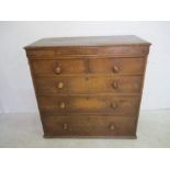 A Victorian, oak chest of five drawers.