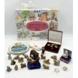 A collection of Wade Whimsies, Crackers etc and Butlins ephemera including Loyalty Club pin badges.