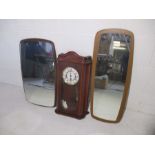 Two mid century mirrors plus a Hermle wall clock.
