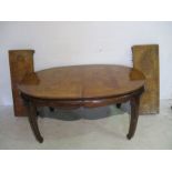 Walnut veneered Italian style table, with two leaves.