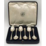 A cased set of hallmarked silver coffee spoons
