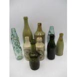 A collection of ten antique bottles including J.B.Bowler (Bath) The Oakhill Brewery, H.Johnson (