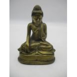 A brass Buddha. Height 13cm.