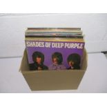 A collection of 12" vinyl records including Deep Purple, Simon & Garfunkel, Santana, Jimi Hendrix,