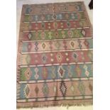 A large Indian Dhurrie rug 185cm x 270cm