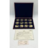 A cased set of "Portraits of the Queen" gold-plated commemorative coins/medallions