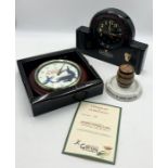 A small collection of Guinness memorabilia including ceramic match striker and clock along with
