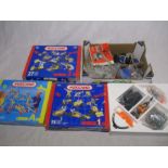 A collection of three boxed Meccano sets including Junior Meccano, along with some vintage loose