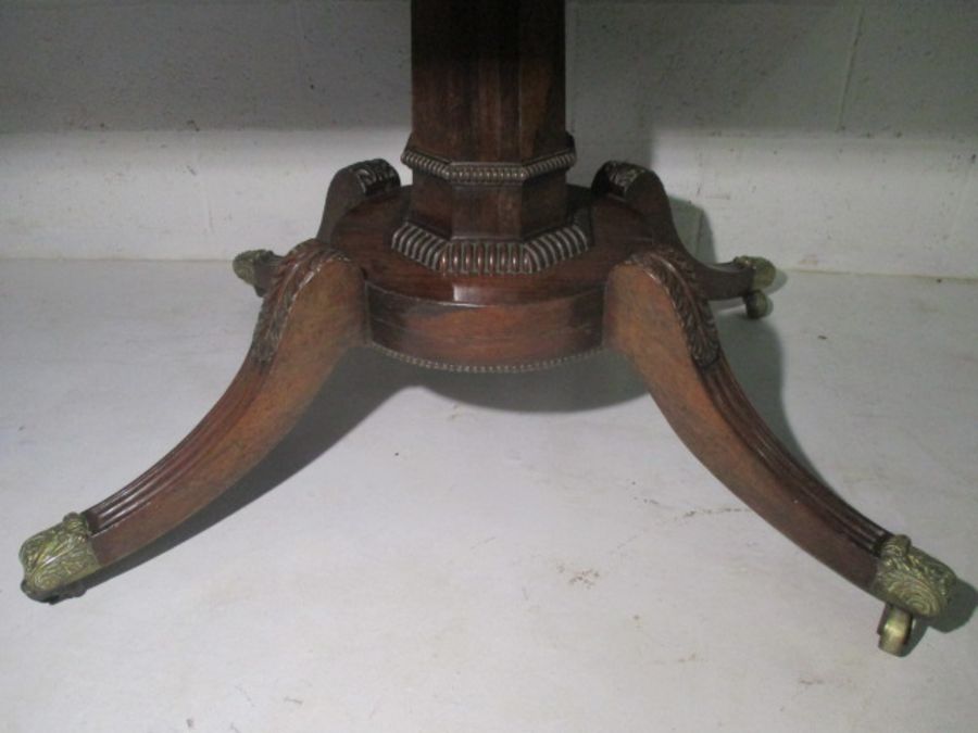 A Victorian rosewood veneered tip up table on quatrefoil legs. - Image 2 of 16