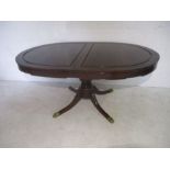 A mahogany dining table with with extendable leaf - total length with leaf 224cm