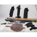 A collection of archery accessories including recurve bow ( no fixings) arrows, quivers etc.