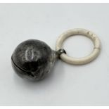 A hallmarked silver rattle A/F