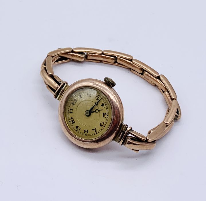 A Victorian 9ct rose gold wristwatch with 9ct strap, total weight 20.2g