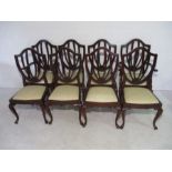 A set of eight shield back dining chairs on cabriole legs, including two carvers