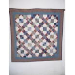 A patchwork wall hanging