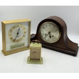 A collection of three clocks including a Sewills millennium countdown clock, a Swiss carriage