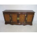 A Chinese style breakfront sideboard