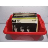 A collection of 12" vinyl records including The Beatles, Bob Dylan, Jimi Hendrix, Pink Floyd, Neil