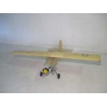 A radio controlled model plane "The Duke". Wing span 170cm. Untested.