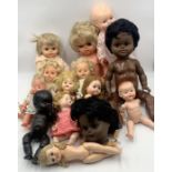 A collection of various vintage dolls including tiny tears etc.