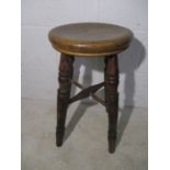 An antique elm stool