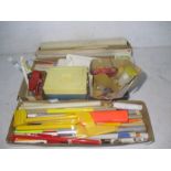 A collection of radio controlled model plane construction parts etc