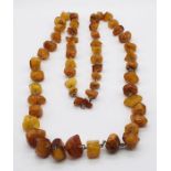 A vintage amber necklace with metal links- total weight 116g
