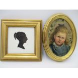 A small oil painting of a girl along with a silhouette