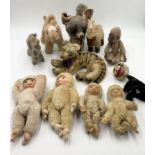 A collection of vintage felt and other teddys including four monkeys with plastic faces, Clemens