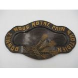 A vintage carved wooden French bread board "Donnez Nous Notre Pain Quotidien" (Give Us Our Daily