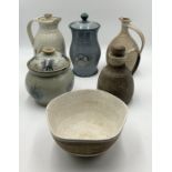 A collection of various studio pottery including carafes etc.