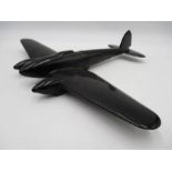 A WWII black Bakelite aircraft recognition model of a German bomber (Heinkel III Mk 5)