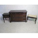 A Stag chest of six drawers and bedside cabinet, along with a piano stool