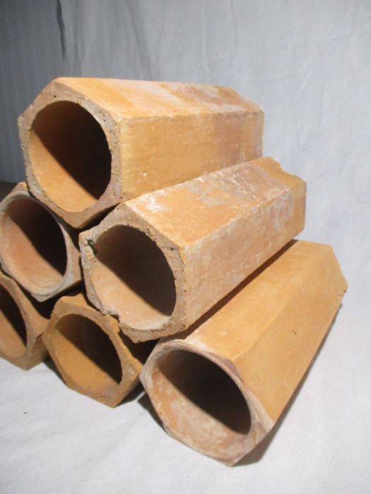 A set of six hexagonal terracotta pipes for wine storage - length 31cm - Image 2 of 5