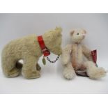 A vintage Hermann Teddy on four legs with collar and chain in nose, original tag, along with a