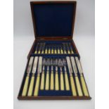 A canteen of vintage cutlery (12 place setting) in mahogany box
