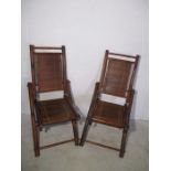 A pair of Bamboo folding chairs