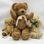 A collection of three Merrythought Teddy bears including Yes No Cheeky 292/500 with moving head