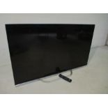 A LG flat screen 48" TV with controller - untested