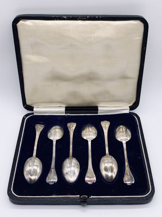 A cased set of hallmarked silver coffee spoons