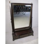 A Georgian toilet mirror with three drawers.