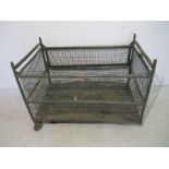 A metal green industrial stackable trolley from Axminster Carpets - length 127cm, depth 79cm, height