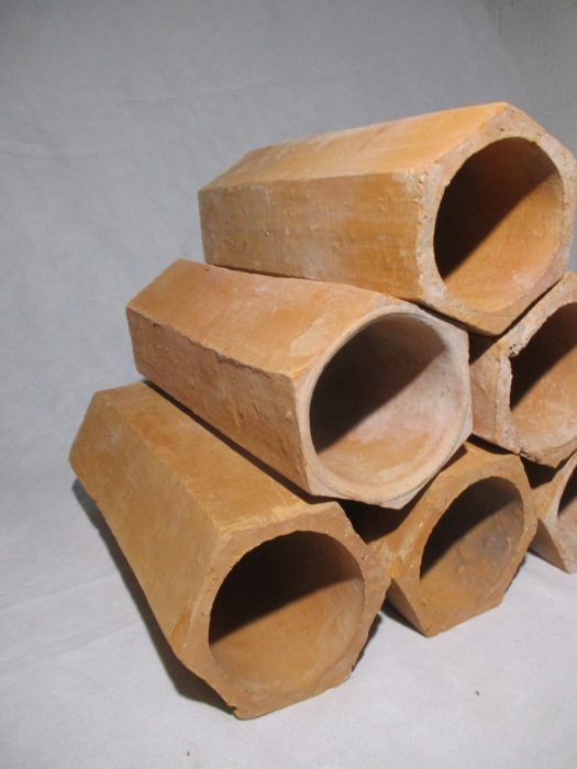 A set of six hexagonal terracotta pipes for wine storage - length 31cm - Image 3 of 5