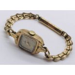 A 9ct gold Tudor (Rolex) ladies watch on a 9ct gold strap, total weight 14g