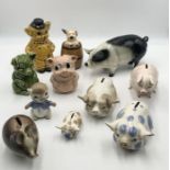 A collection of ceramic piggy banks including Szeiler, Goebel, etc.